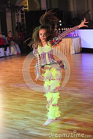 Unidentified female teens age 14-17 compete in latino dance on the Artistic Dance European Championship Editorial Stock Photo