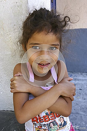 Unidentified girl playing in Favela Rocinha Editorial Stock Photo