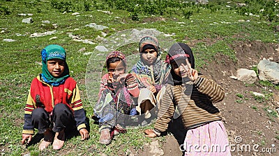 Unidentified poor Indian beggar boy and girl in Kashmir. Children of the early ages are often brought to the begging profession. Editorial Stock Photo