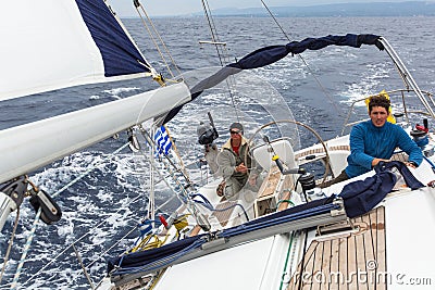 Unidentified sailors participate in sailing regatta 12th Ellada Autumn 2014 among Greek island group in the Aegean Sea Editorial Stock Photo