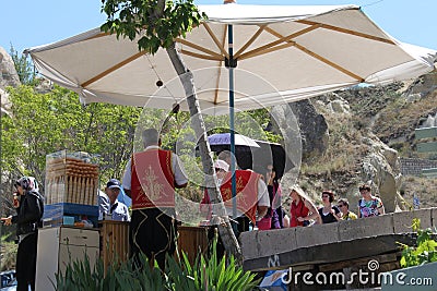 Unidentified seller of Turkish ice cream at Goreme, Turkey. Produced by orchid flowers. Editorial Stock Photo