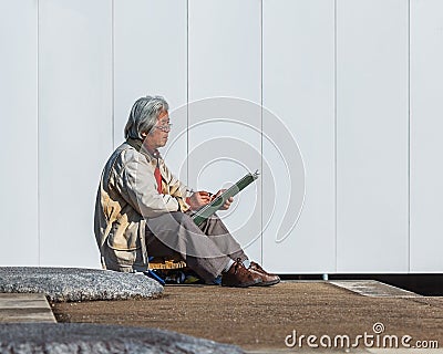 Unidentified Senior Japanese woman at Kofukuji Temple in Nara Editorial Stock Photo