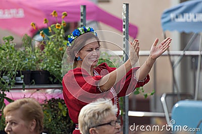 Unidentified spectator applaud and smiling Editorial Stock Photo