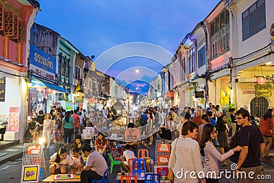 Unidentified tourists are shopping at old town night market is called Lard Yai in Phuket, Thailand Editorial Stock Photo