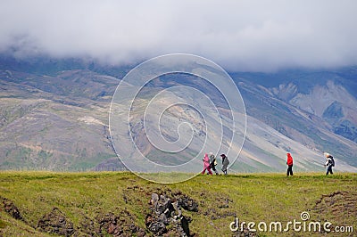 Unidentified tourists walking back from visit Gatklettur Stone A Editorial Stock Photo