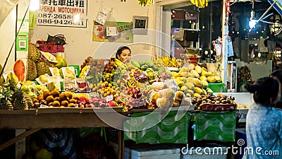 An unidentified vendor selling tropical, exotic fruit on the str Editorial Stock Photo