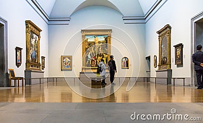 Unidentified visitors in one of the halls of the London National Gallery Editorial Stock Photo