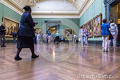 Unidentified visitors in one of the halls of the London National Gallery Editorial Stock Photo