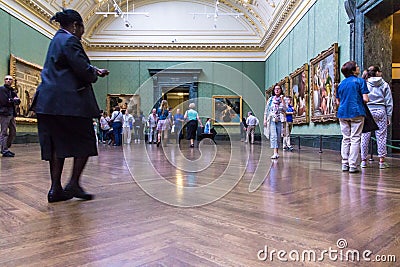Unidentified visitors in one of the halls of the London National Gallery Editorial Stock Photo