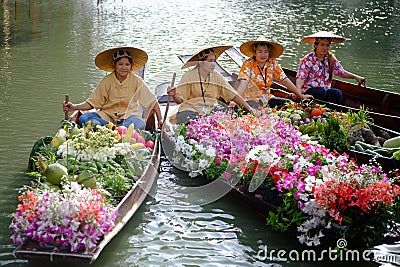 Unidentified women vendor fruits and flowers. Editorial Stock Photo