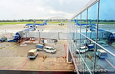 Unidentified workers preparing airplanes Editorial Stock Photo