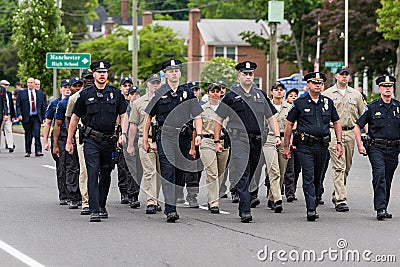 Uniformed police officers and Cadets during parade march Editorial Stock Photo