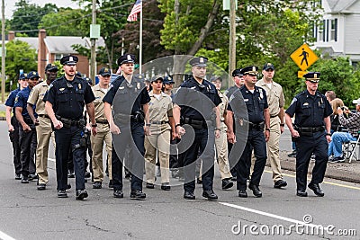 Uniformed police officers and Cadets during parade march Editorial Stock Photo