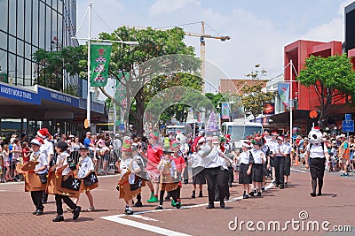 Uniformed volunteer health workers marching in Christmas parade Editorial Stock Photo