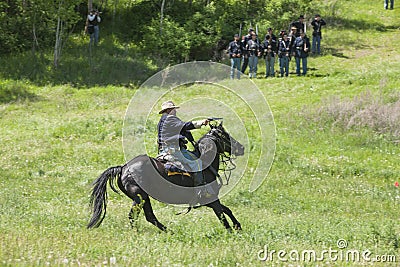 Union army calvary reenactor firing pistol. Editorial Stock Photo