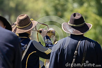 A union army soldier plays the trumpet during a Civil War reenactment Editorial Stock Photo
