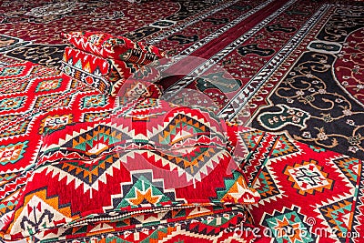 Vintage unique arabic carpets and pillows Stock Photo