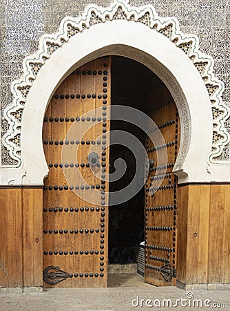 Unique arabic style doorway with wooden doors Stock Photo