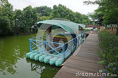 Unique boat on the edge of the swamp Stock Photo