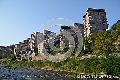 Unique buildings in Kapan city and Vokhchi river Editorial Stock Photo