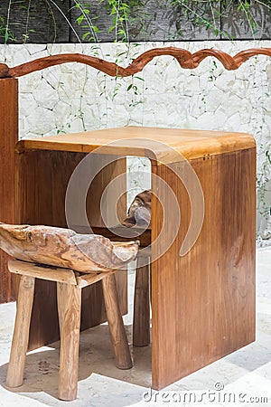 Unique chair made from hard wood Stock Photo