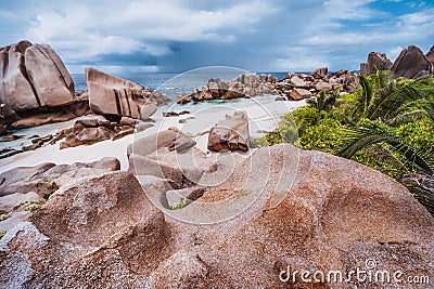 Unique granite rocks and cute remote and hidden Anse Marron beach in La Digue island, Seycheles islands Stock Photo