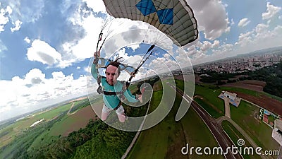 Unique images of a parachutist making selfie. Stock Photo