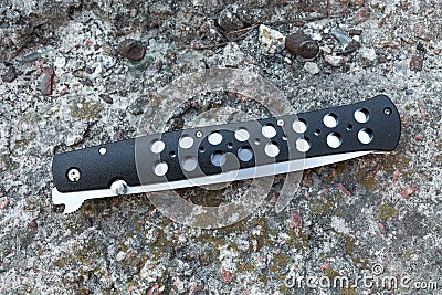 Unique knife folded. Black. Gray. Stock Photo