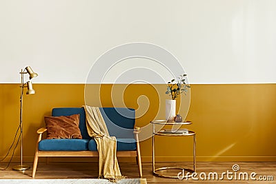 Unique living room in modern style interior with design sofa, elegant gold coffee table,copy space, flowers in vase, decoration. Stock Photo