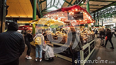 Borough market in central London colorful kiosks and stalls.. Editorial Stock Photo