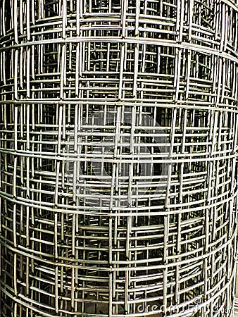 Unique patterns of woven metal wire showcasing intricate design and structure in a close-up view Stock Photo