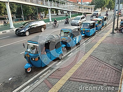 Unique public transportation in Jakarta called & x22;Bajaj& x22; Editorial Stock Photo