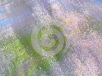 Unique shiny piece of artwork. Part pink and green painting with glitter. Beautiful background. Holographic real texture Stock Photo