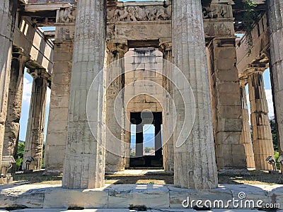 A unique view looking through the columns of the doric columns of The Temple of Hephaestus or Hephaisteion Stock Photo