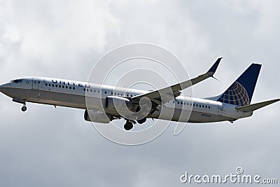 United Airlines plane in US airspace Editorial Stock Photo