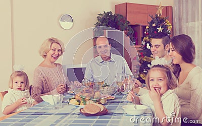 United family at festive table Stock Photo