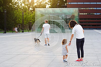 United family on a walk in the city park. Stock Photo