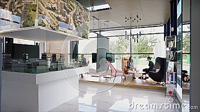 United Kingdom - London 05.12.21: Interior of a business center with a construction complex 3D layout. Video. Informal Editorial Stock Photo