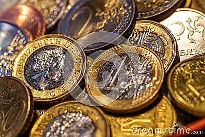 United kingdom Pound coin.British coins stack on black, pound sterling,Business concept.Numismatics. Iron money.Collection Editorial Stock Photo