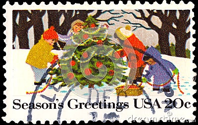 A stamp printed in UNITED STATES OF AMERICA shows Kids Making A Snowman with inscription Editorial Stock Photo