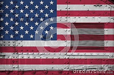 United States of America flag depicted on side part of military armored tank closeup. Army forces conceptual background Stock Photo