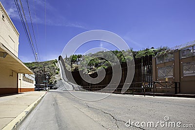 United States Border Wall with Mexico at Nogales Arizona Stock Photo