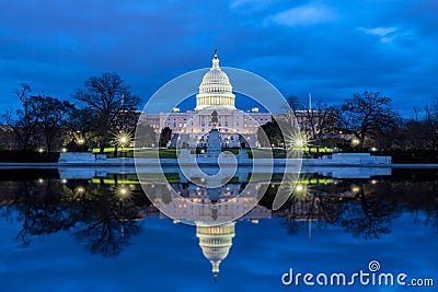 The United States Capitol with reflection at night, Washington DC Stock Photo