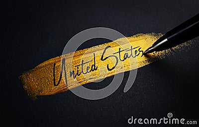 United States Handwriting Text on Golden Paint Brush Stroke Stock Photo