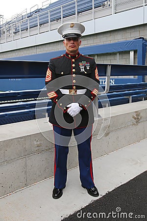 United States Marine officer at Billie Jean King National Tennis Center before unfurling the American flag at US Open 2014 Editorial Stock Photo