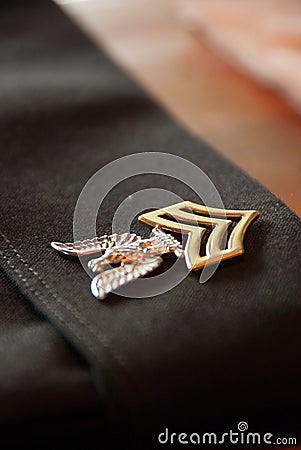 United States Navy First Class Petty Officer Pin on Service Uniform Cover Editorial Stock Photo