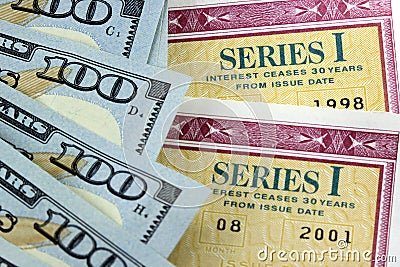 United States Savings Bonds with American Currency Stock Photo