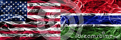 United States vs Gambia smoke flags concept placed side by side Stock Photo