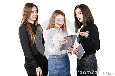 United Team Of Business Women. Portrait team of three smiling businesspeople isolated on white background. business women standing Stock Photo