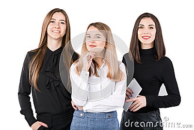 United Team Of Business Women. Portrait team of three smiling businesspeople isolated on white background. business women standing Stock Photo